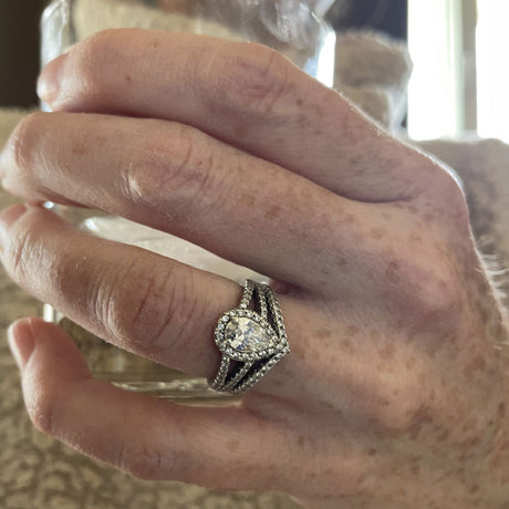 Model Wearing Split Shank Ring, Wishbone Curved Eternity Ring