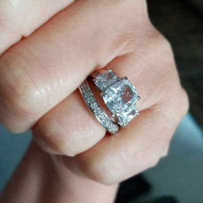 Model Wearing 3-Stone Ring, Curved Half Eternity Ring