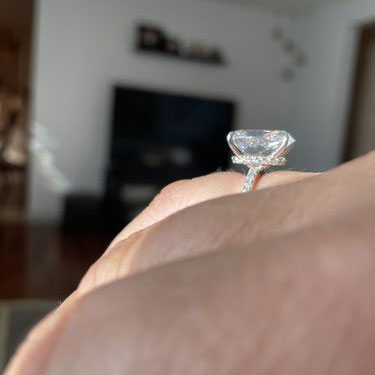 Image Contain: Model Wearing Solitaire with Side Stones Ring