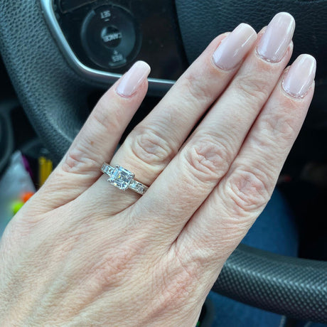 Model Wearing Solitaire with Side Stones Ring