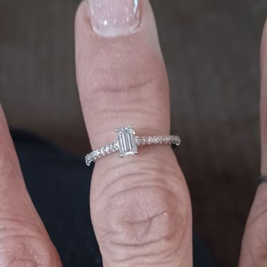 Image Contain: Model Wearing Solitaire with Side Stones Ring