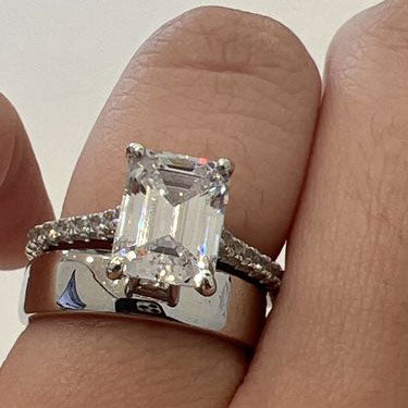 Image Contain: Model Wearing Band, Solitaire with Side Stones Ring