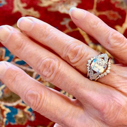 Image Contain: Model Wearing Solitaire Ring, Wishbone Curved Band