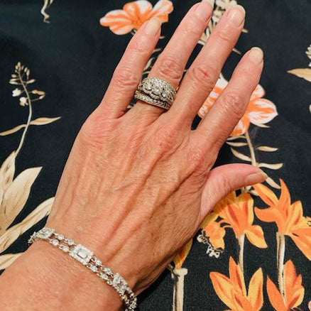 Image Contain: Model Wearing 3-Stone Split Shank Ring, Art Deco Chain Bracelet, Curved Half Eternity Ring