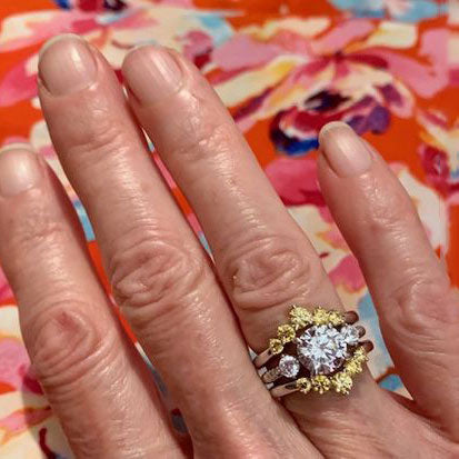 Image Contain: Model Wearing 3-Stone Ring, 5-Stone Curved Band