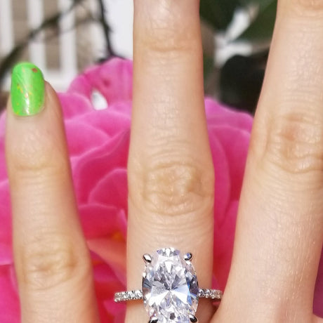 Image Contain: Model Wearing Solitaire with Side Stones Ring