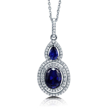 Halo Sapphire-Blue Oval CZ Set in Sterling Silver