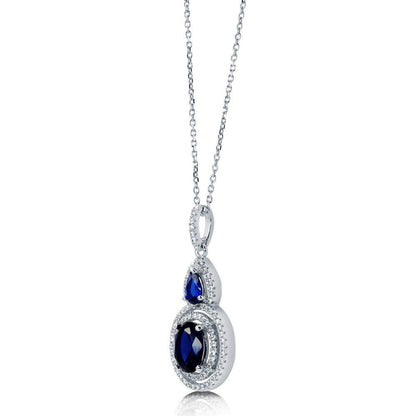 Halo Sapphire-Blue Oval CZ Set in Sterling Silver