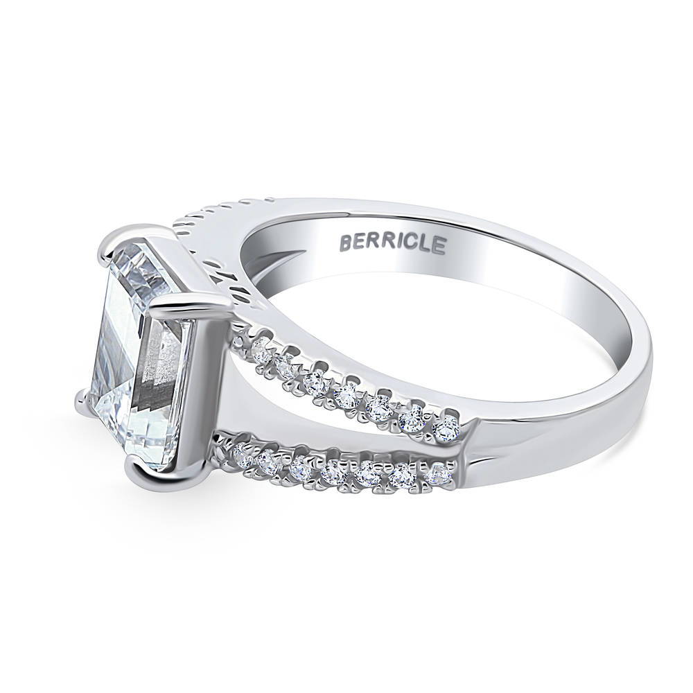 Angle view of Solitaire 2.6ct Emerald Cut CZ Split Shank Ring in Sterling Silver, 5 of 9