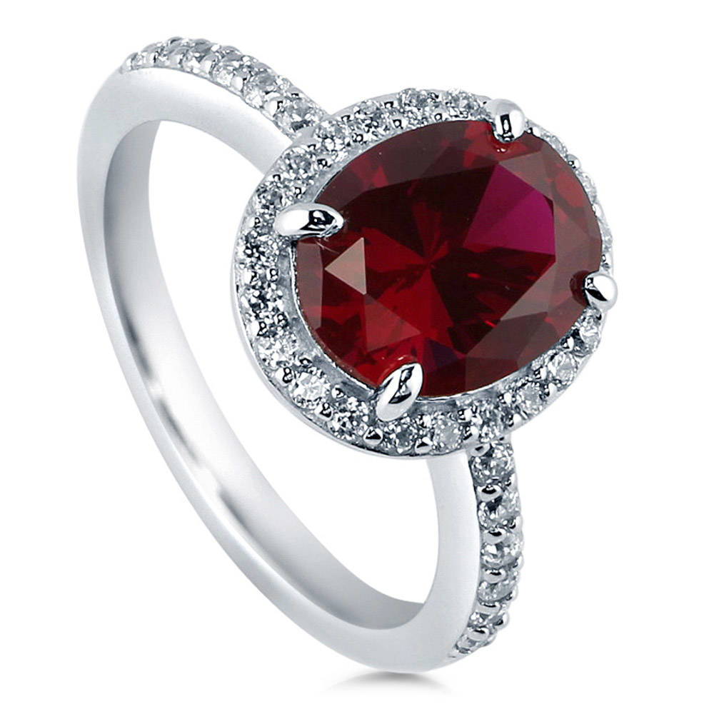 Halo Simulated Ruby Oval CZ Ring in Sterling Silver, front view