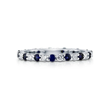 Simulated Blue Sapphire Pave Set CZ Eternity Ring in Sterling Silver