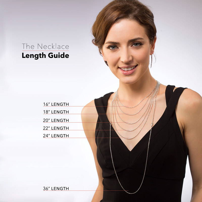Model wearing multiple necklace chains from 16 to 36 inches for the length guide, 8 of 8