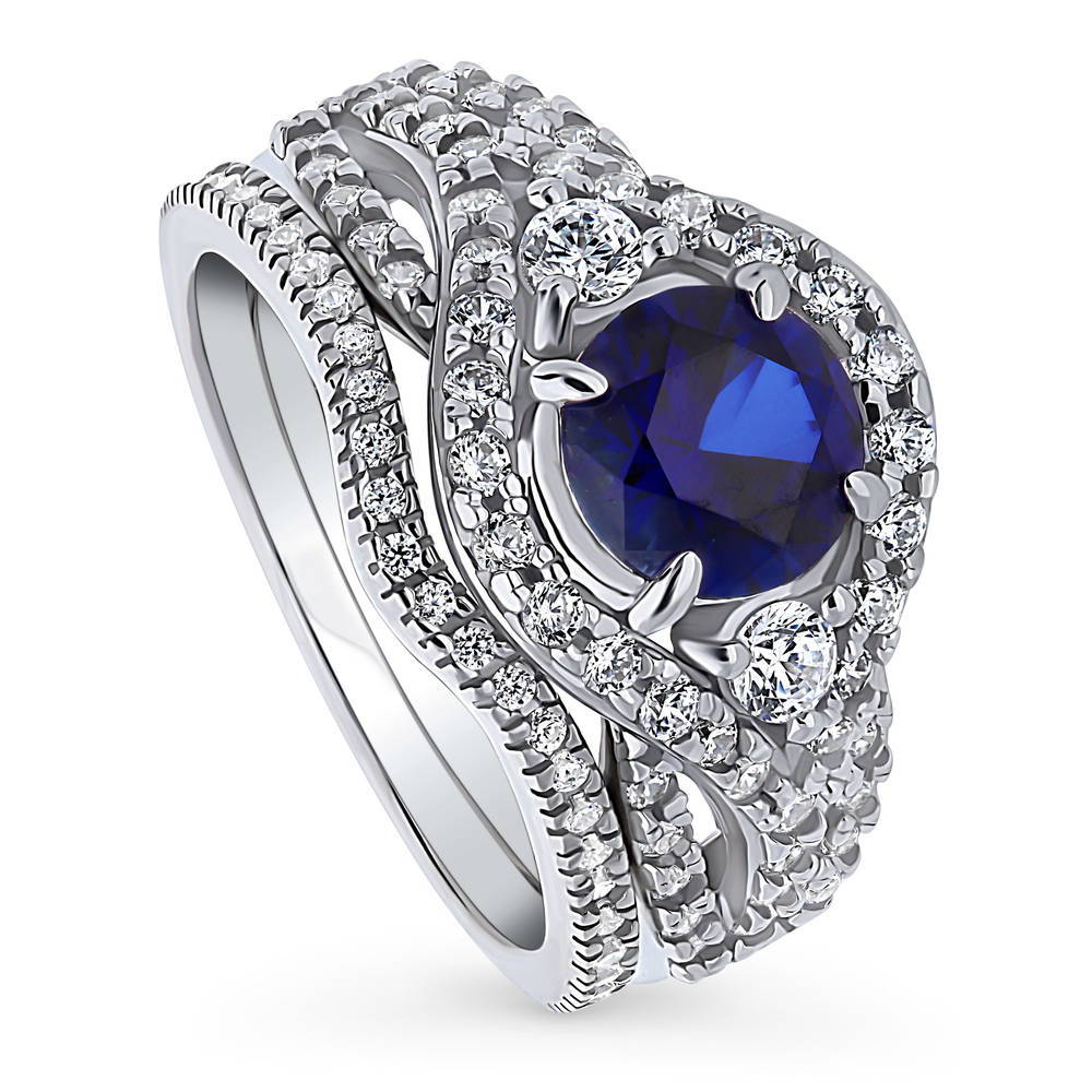 Front view of 3-Stone Woven Halo Sapphire-Blue CZ Ring Set in Sterling Silver, 3 of 16