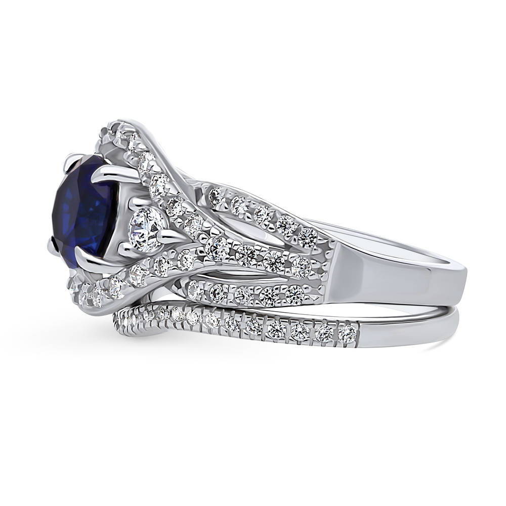 Angle view of 3-Stone Woven Halo Sapphire-Blue CZ Ring Set in Sterling Silver, 5 of 16