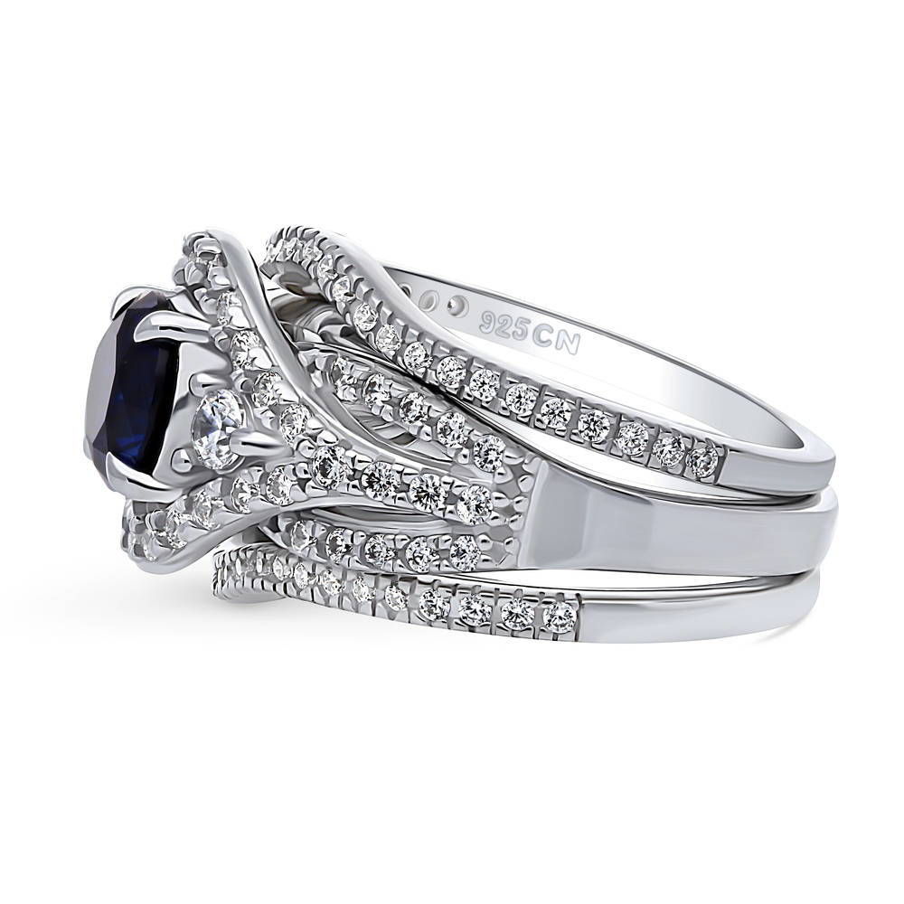 Angle view of 3-Stone Woven Halo Sapphire-Blue CZ Ring Set in Sterling Silver, 5 of 16