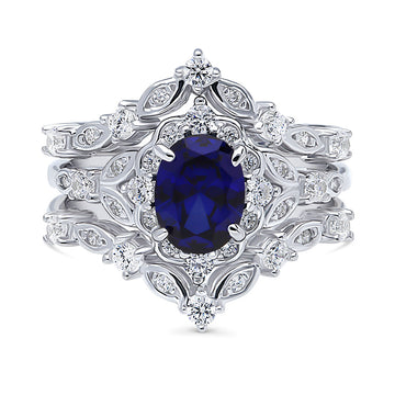 Chevron Halo Simulated Blue Sapphire CZ Ring Set in Sterling Silver