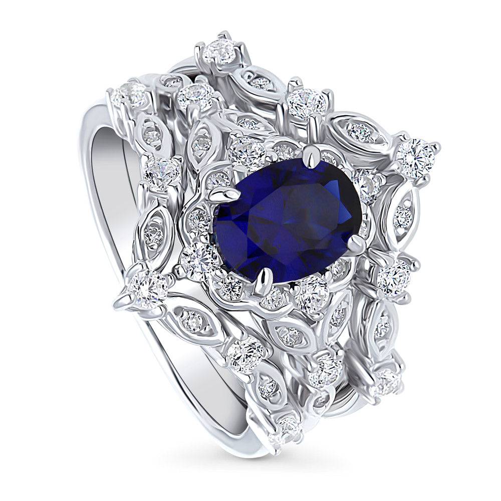 Front view of Halo Simulated Blue Sapphire Oval CZ Ring Set in Sterling Silver, 4 of 18