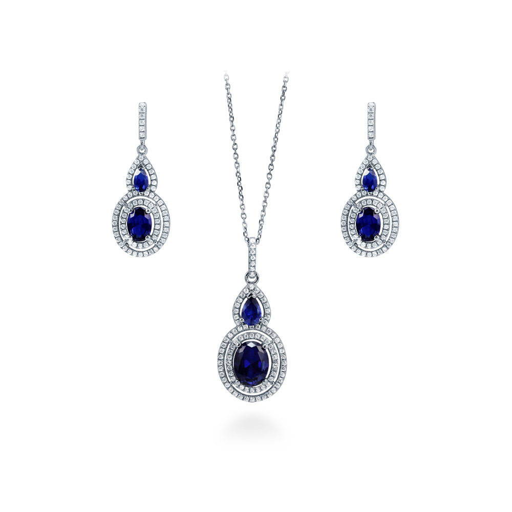 Halo Simulated Blue Sapphire Oval CZ Set in Sterling Silver, 1 of 9